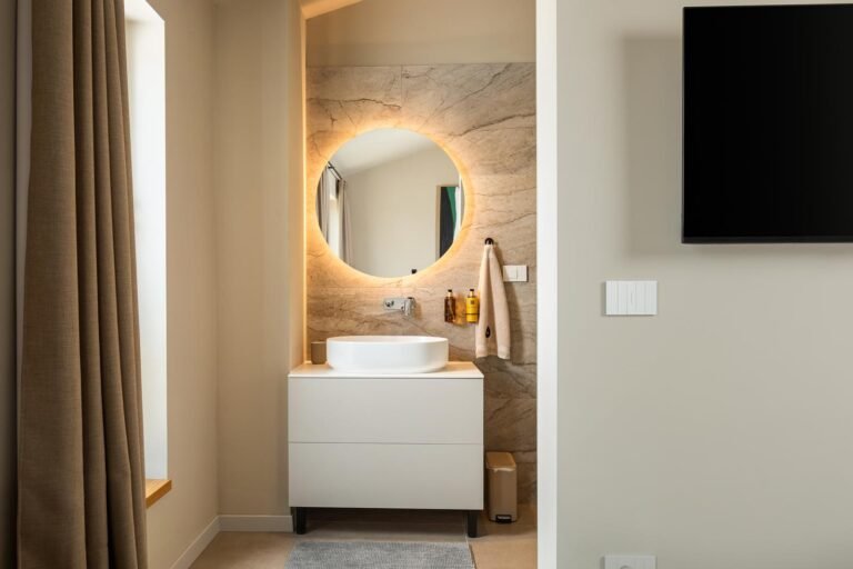 Modern bathroom with illuminated mirror in luxury holiday villa in Istria
