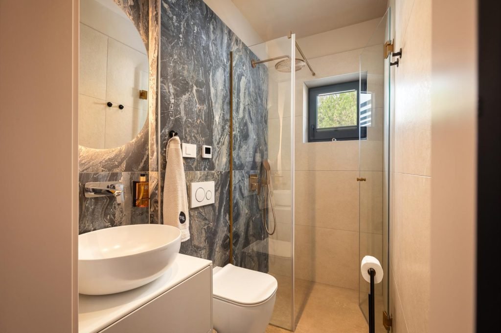 Modern bathroom with walk-in shower in luxury villa in Istria near Poreč