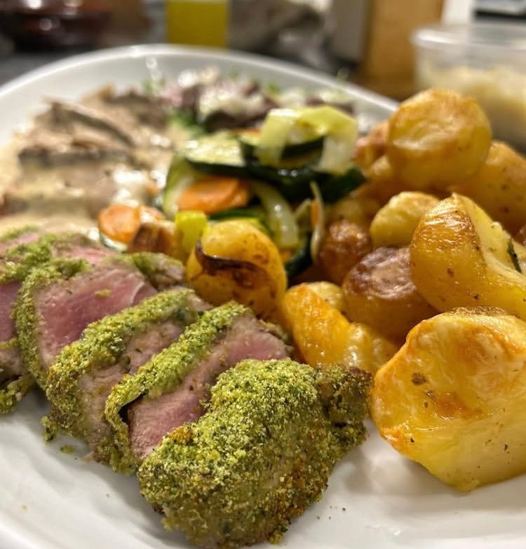 Traditional Istrian meat dish with roasted potatoes and vegetables, authentic local cuisine served in a konoba near Poreč